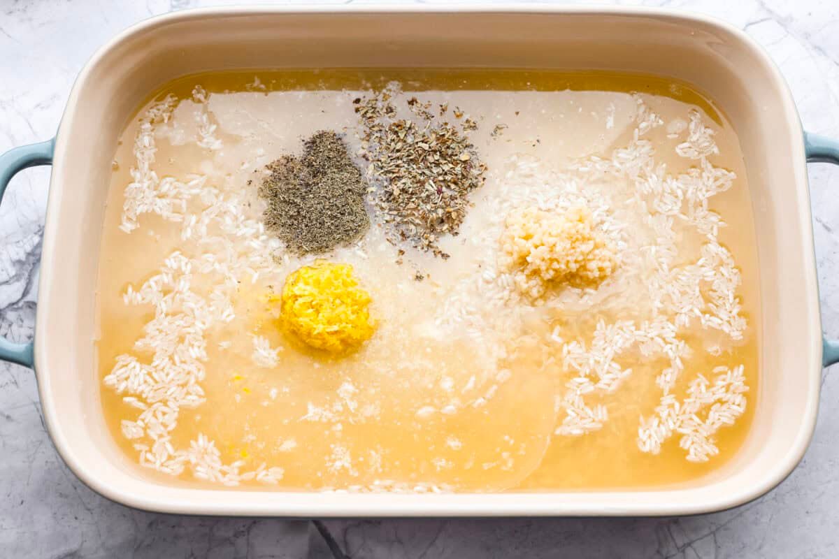 You guys love lemon chicken anything—and honestly, same. So I had to give you this lemon chicken casserole. With my signature made from scratch lemon herb sauce, you'll want this on repeat! All of the sauce ingredients added to the baking dish.