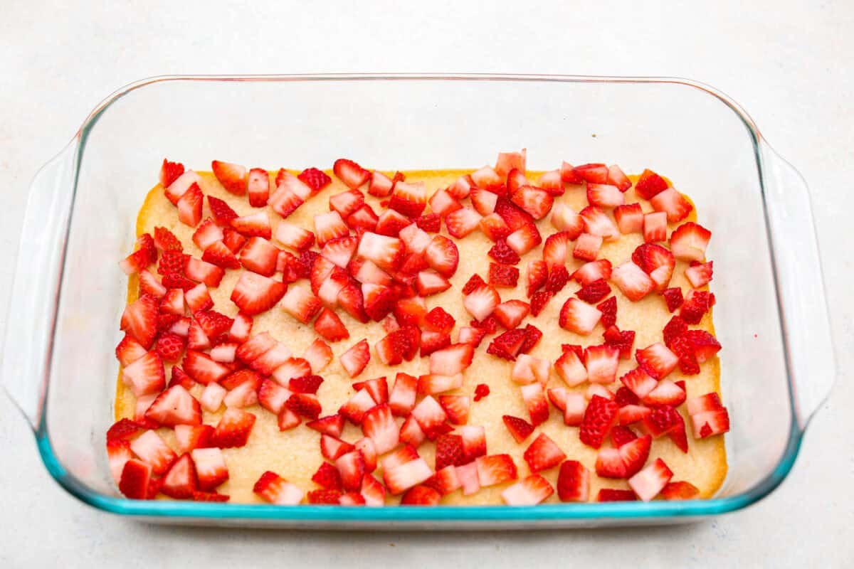 My Strawberry Delight is the ultimate summer showstopper! Buttery crust, juicy strawberries, sweet jello, and fluffy topping—one bite and everyone’s hooked. Fresh cut strawberries on top of the crust layer.