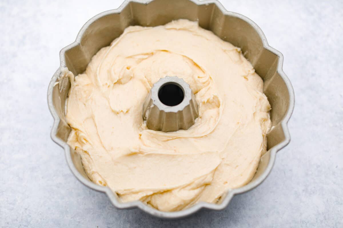 https://www.target.com/p/kitchenaid-5qt-10-speed-stand-mixer-with-copper-bowl-french-linen-hearth-38-hand-8482-with-magnolia/-/A-90064793#lnk=sametab Overhead shot of the cake batter in the bundt pan.