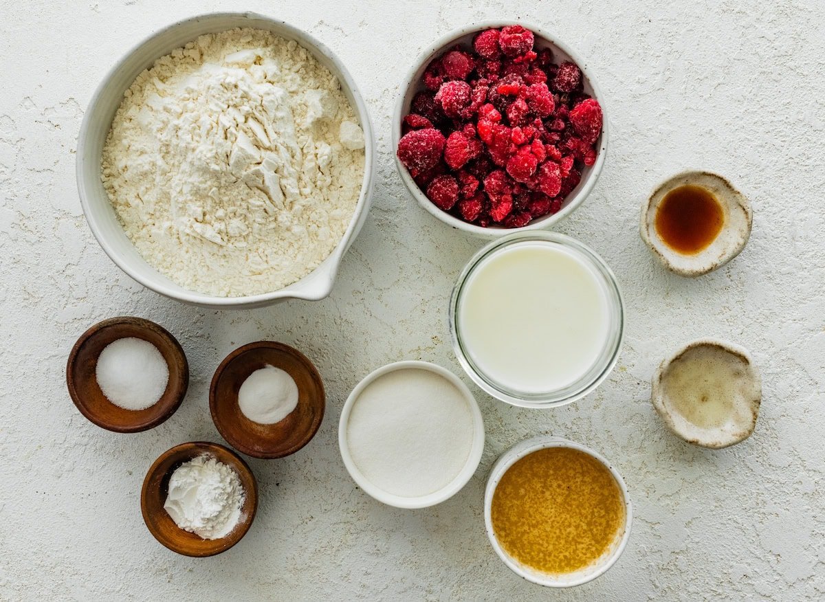 ingredients in bowls to make raspberry almond biscuits.
