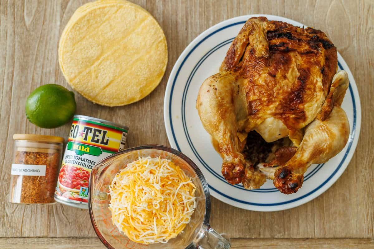 My Baked Chicken Tacos recipe is a fast and delicious 30-minute meal using rotisserie chicken and Rotel for an out-of-this world easy dinner! Ingredients for making quick baked chicken tacos using tortillas, lime, Rotel, Taco Seasoning, Cheese, and rotisserie chicken