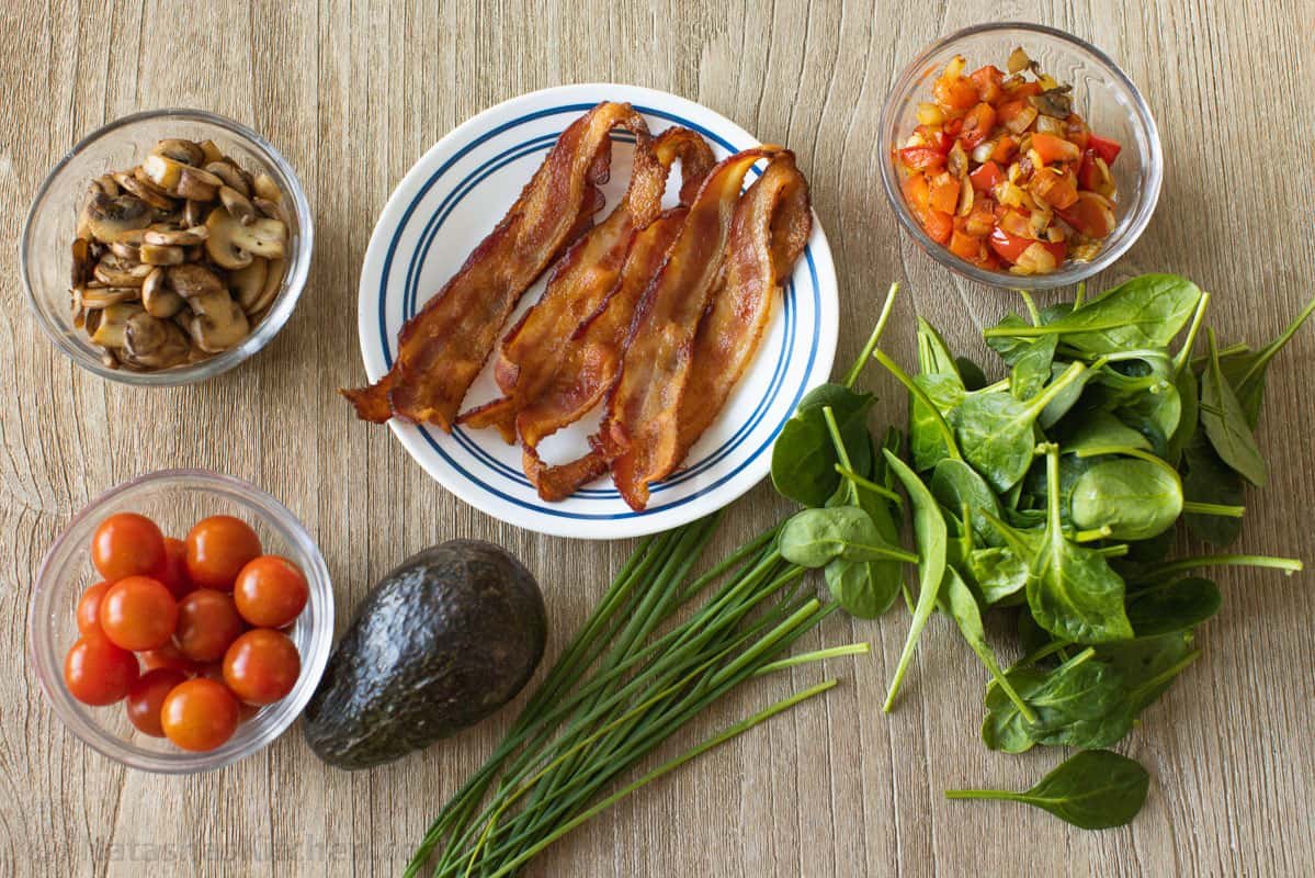 Variations and toppings for omelettes with bacon, spinach, mushrooms and veggies