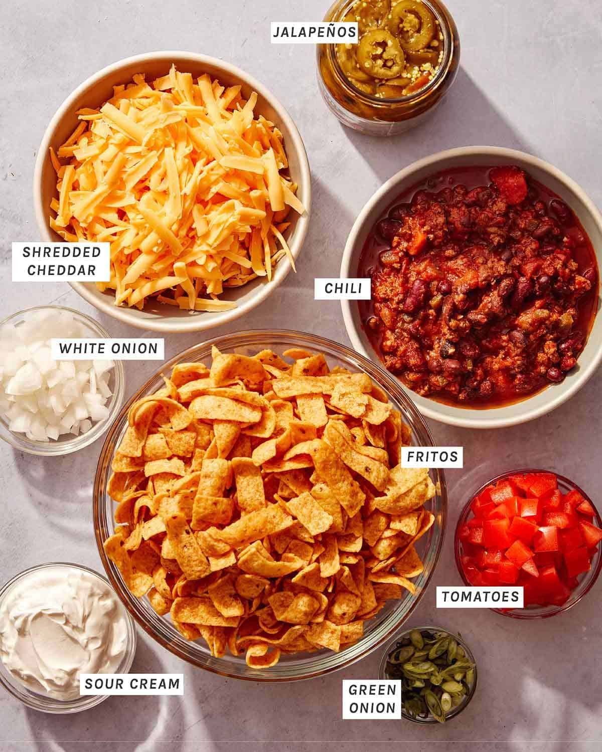 Ingredients to make a frito pie recipe.