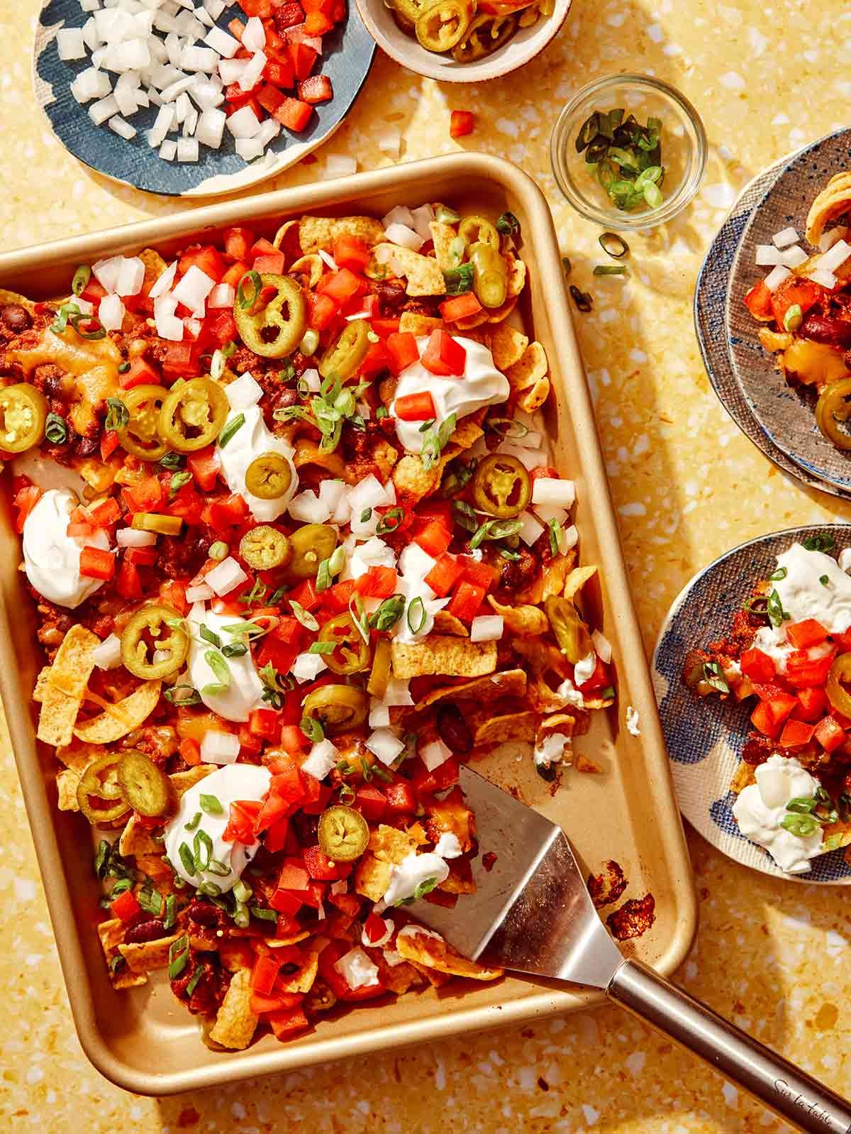 Frito pie and ingredients.