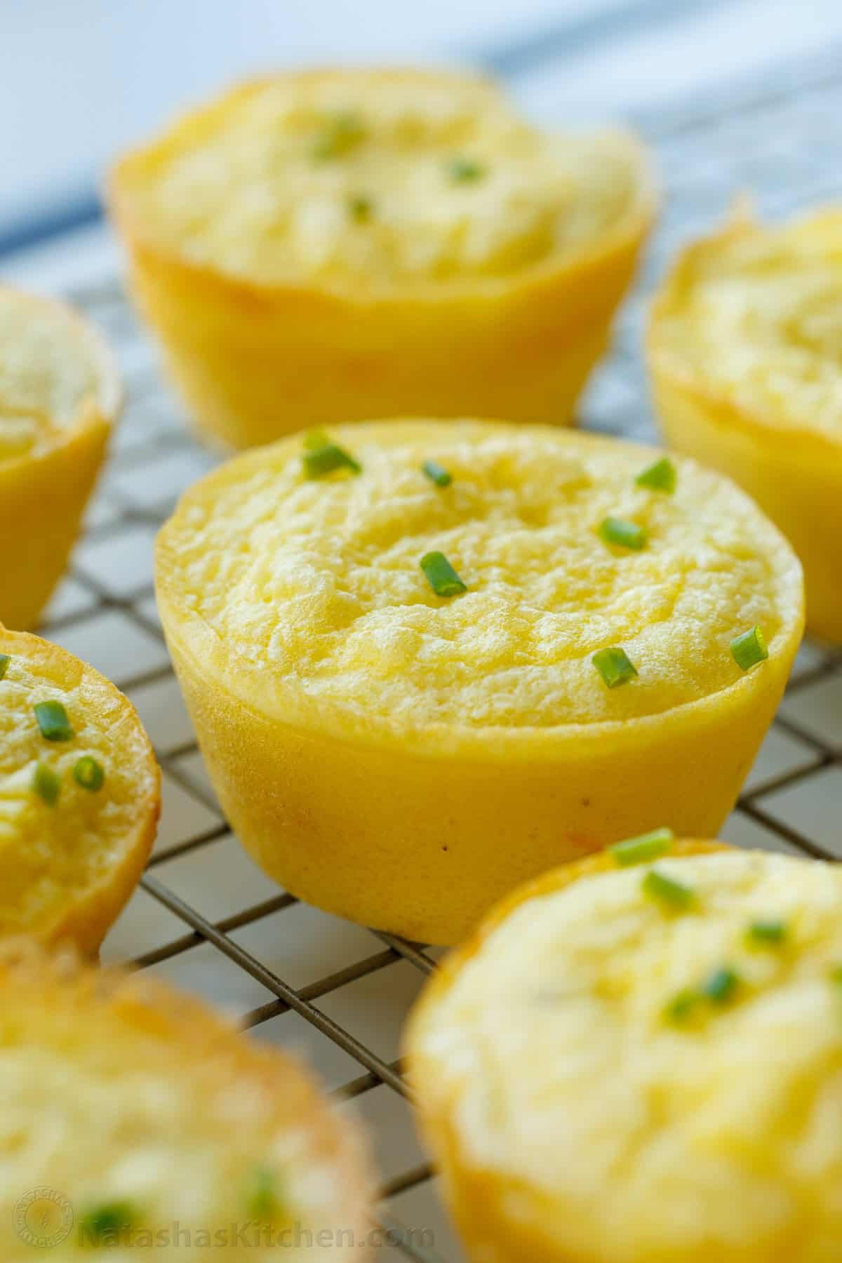 Fluffy, moist, and protein-packed Cottage Cheese Egg bites! It's so easy to make the Starbucks egg bites at home with your favorite mix-ins. Close up of one Starbucks egg bites recipe