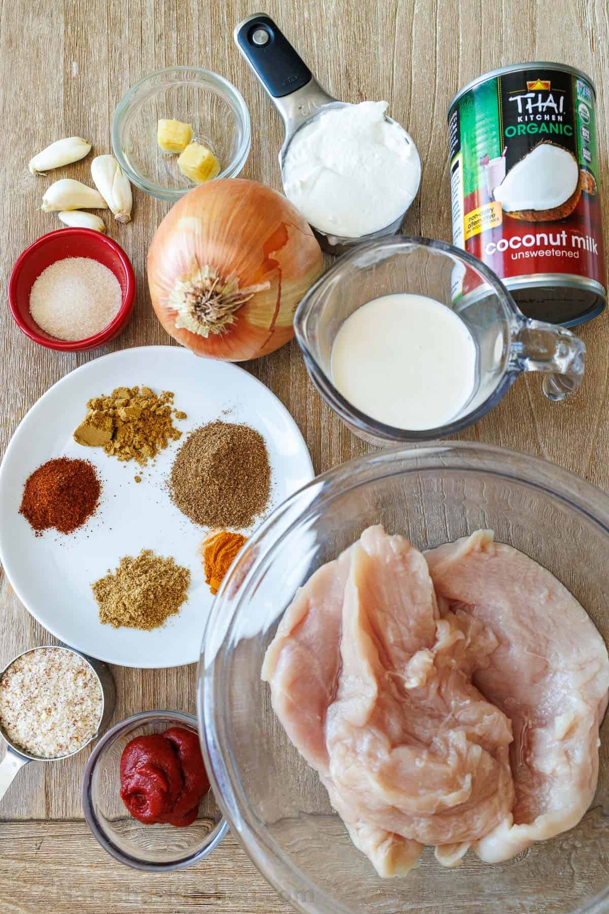 Ingredients for Chicken Korma: Chicken, Onion, Ginger, Garlic, Garam masala, Ground cumin, Ground coriander, Chili powder, Ground turmeric, Tomato paste, Greek yogurt, Coconut milk, Almond flour, Sugar, Heavy whipping cream. Ingredients for Chicken Korma: Chicken, Onion, Ginger, Garlic, Garam masala, Ground cumin, Ground coriander, Chili powder, Ground turmeric, Tomato paste, Greek yogurt, Coconut milk, Almond flour, Sugar, Heavy whipping cream.