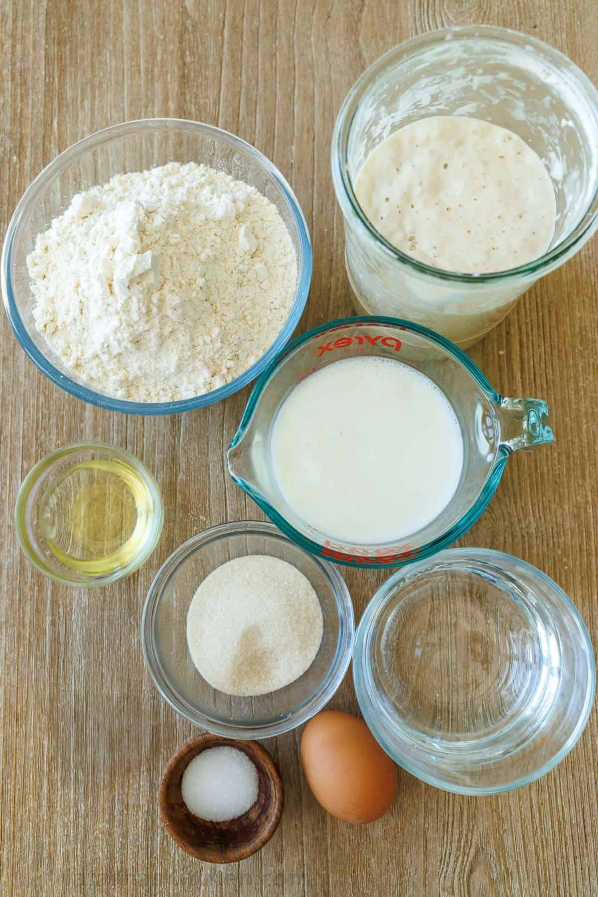 Overnight Sourdough Pancakes are an easy make-ahead breakfast! Mix everything before bed and wake up to bubbly, ready-to-cook pancake batter. Ingredients for Overnight Sourdough Pancakes with active bubbly sourdough starter, liquid ingredients and dry ingredients