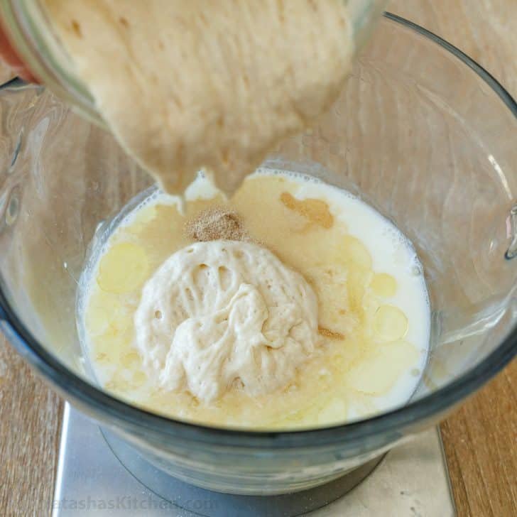 Sourdough Pancakes are a delightful twist on the classic breakfast favorite, with a soft and spongy texture and great sourdough flavor. Adding 100g of sourdough starter to glass bowl with sourdough pancake batter