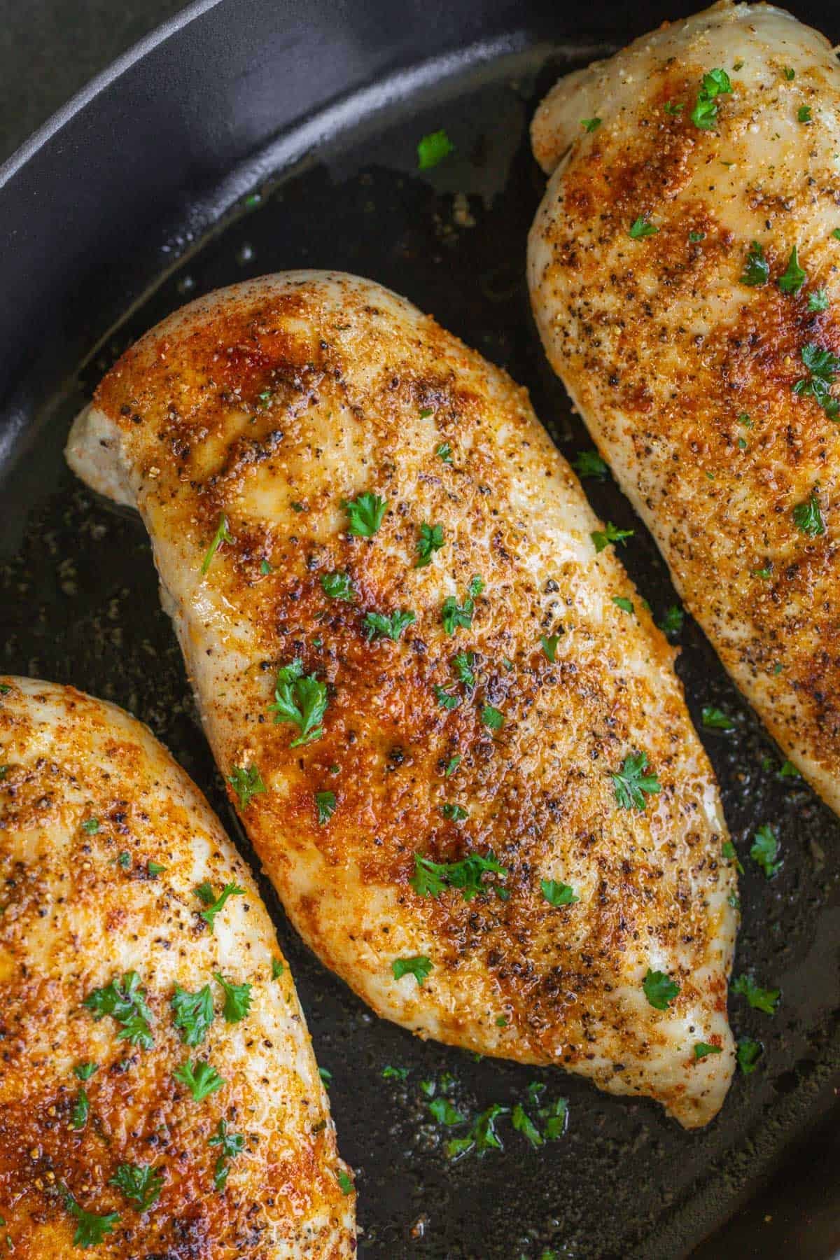Baked Chicken Breast is great as a main dish, salad topper, or even a sandwich protein. Learn how to bake Chicken Breast in the Oven. Up close juicy baked chicken breasts