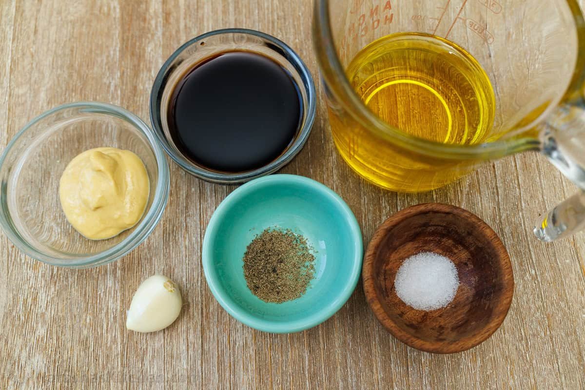 Ingredients for Balsamic Vinaigrette: Extra virgin olive oil, Balsamic vinegar, Dijon mustard, garlic clove (grated or minced), fine sea salt, freshly ground black pepper Ingredients for Balsamic Vinaigrette: Extra virgin olive oil, Balsamic vinegar, Dijon mustard, Garlic clove, Fine sea salt, black pepper