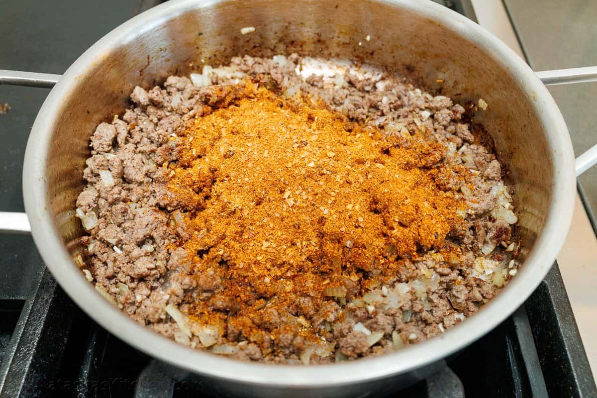 Mexican Beef and Rice Skillet is a quick, 30-minute meal—seasoned beef, loaded rice, and gooey melted cheese. The perfect one-pan wonder! Ground beef in a skillet with taco seasoning on top