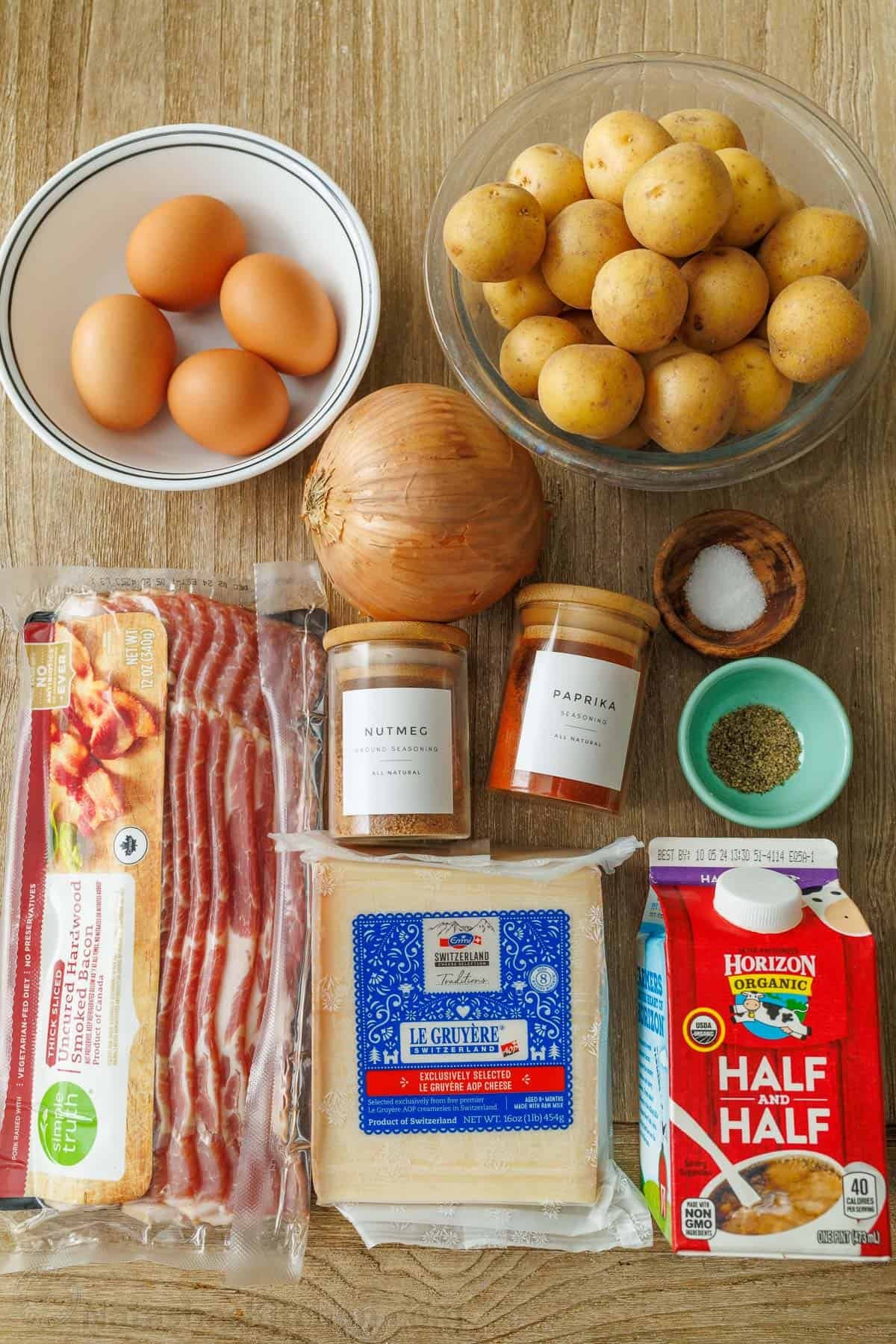 Ingredients for Potato Crust Quiche: Eggs, onion, cheese, baby Yukon potatoes, half and half, bacon, paprika, salt, pepper, and nutmeg Ingredients for Potato Crust Quiche: Eggs, onion, cheese, baby Yukon potatoes, half and half, bacon, paprika, salt, pepper, and nutmeg