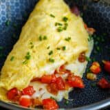 egg omelette in a blue dish for breakfast ideas