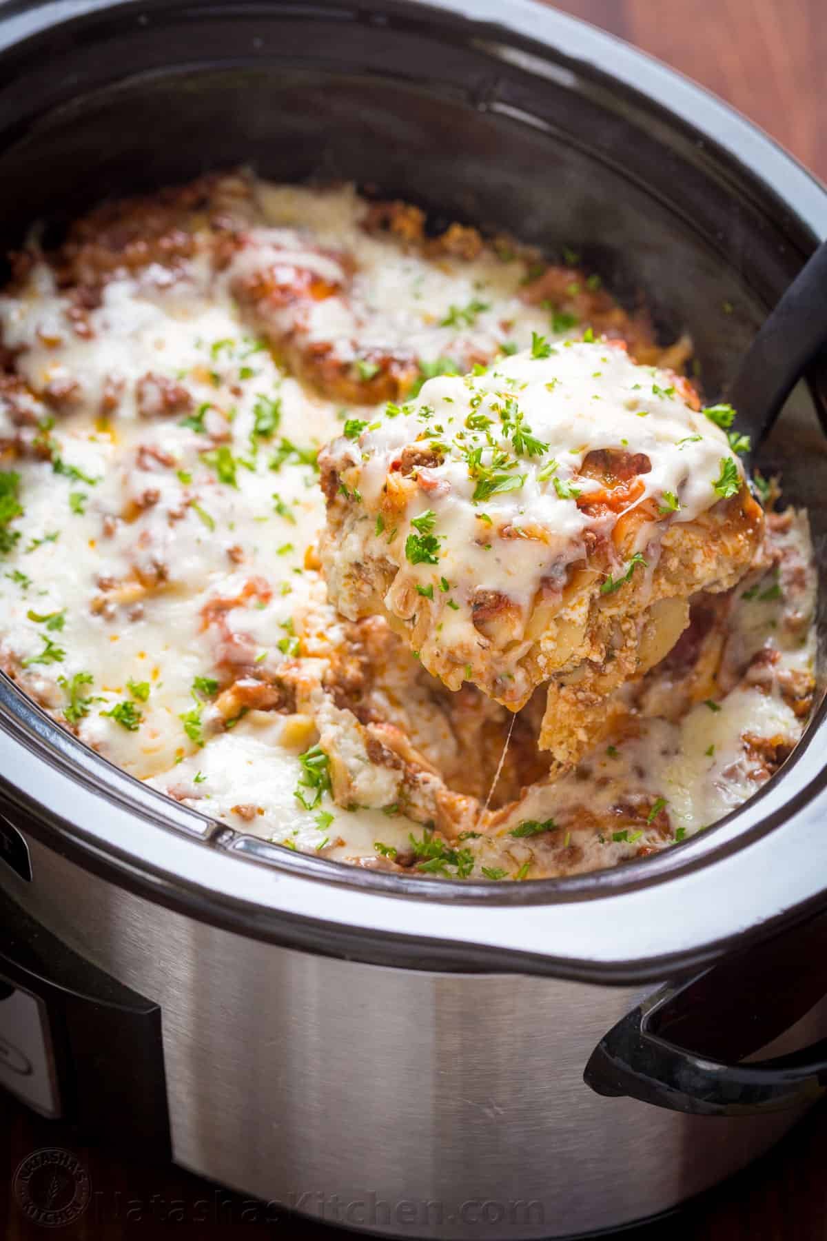 Slow cooker lasagna on a spatula
