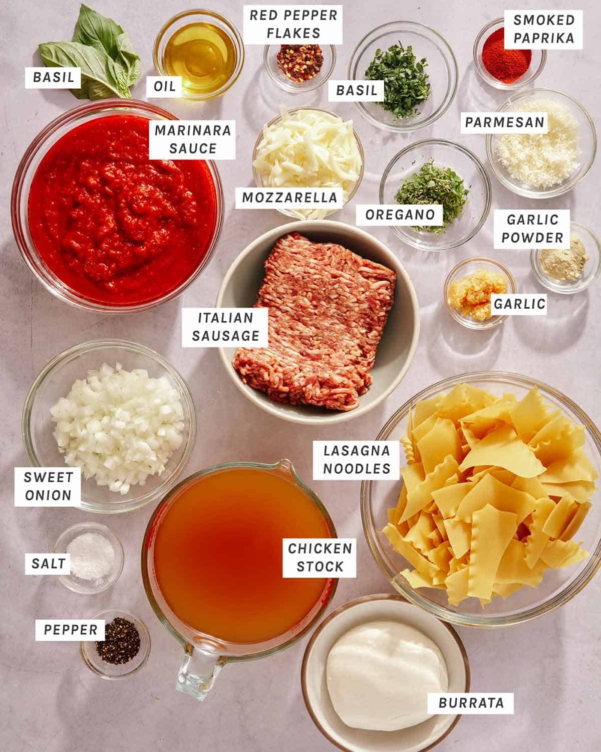 Lasagna soup ingredients on a kitchen counter.