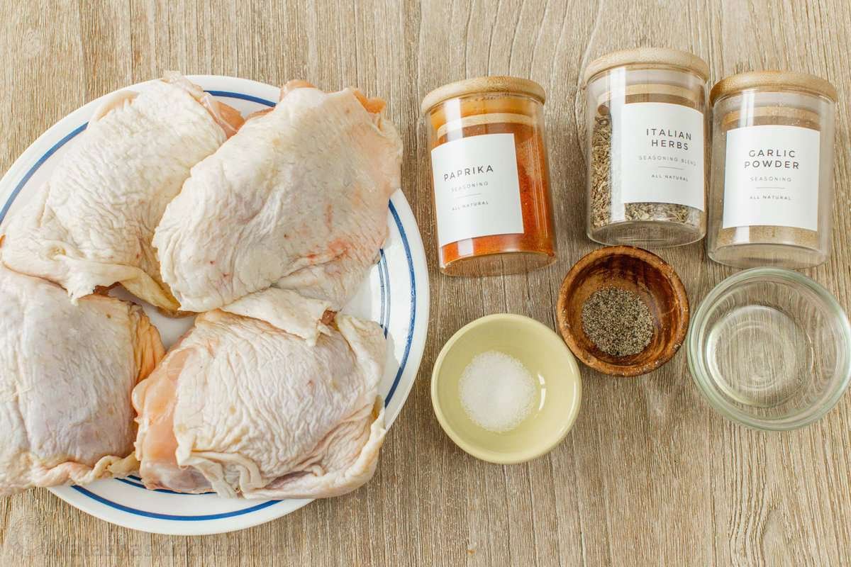 Air fryer chicken thighs are juicy, perfectly seasoned, and ready in a fraction of the time it takes to bake chicken thighs in the oven. The ingredients for making chicken thighs in the air fryer.