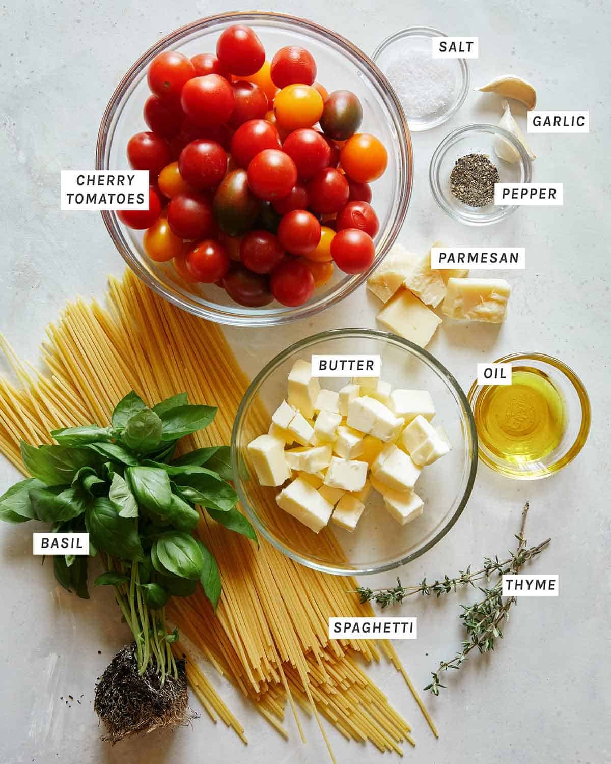 Ingredients to make a butter roasted cherry tomato pasta recipe.