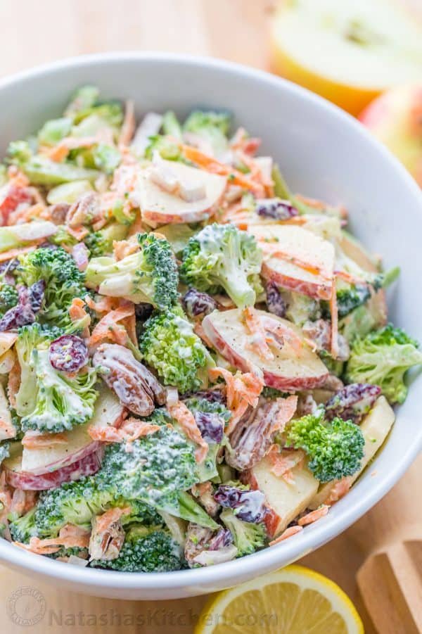 The ORIGINAL Broccoli Salad Recipe - loaded with broccoli, apples, craisins and pecans, and tossed in a creamy lemon dressing. A must-try broccoli salad! | natashaskitchen.com