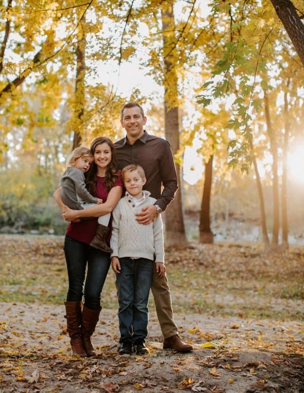 A family posing in a park