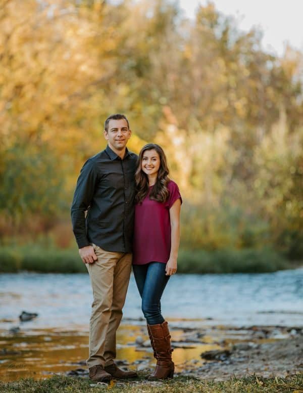 A couple next to the river