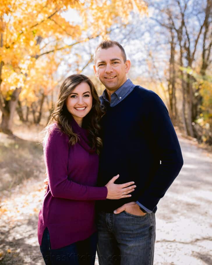 Natasha Kravchuk and husband posing for a picture