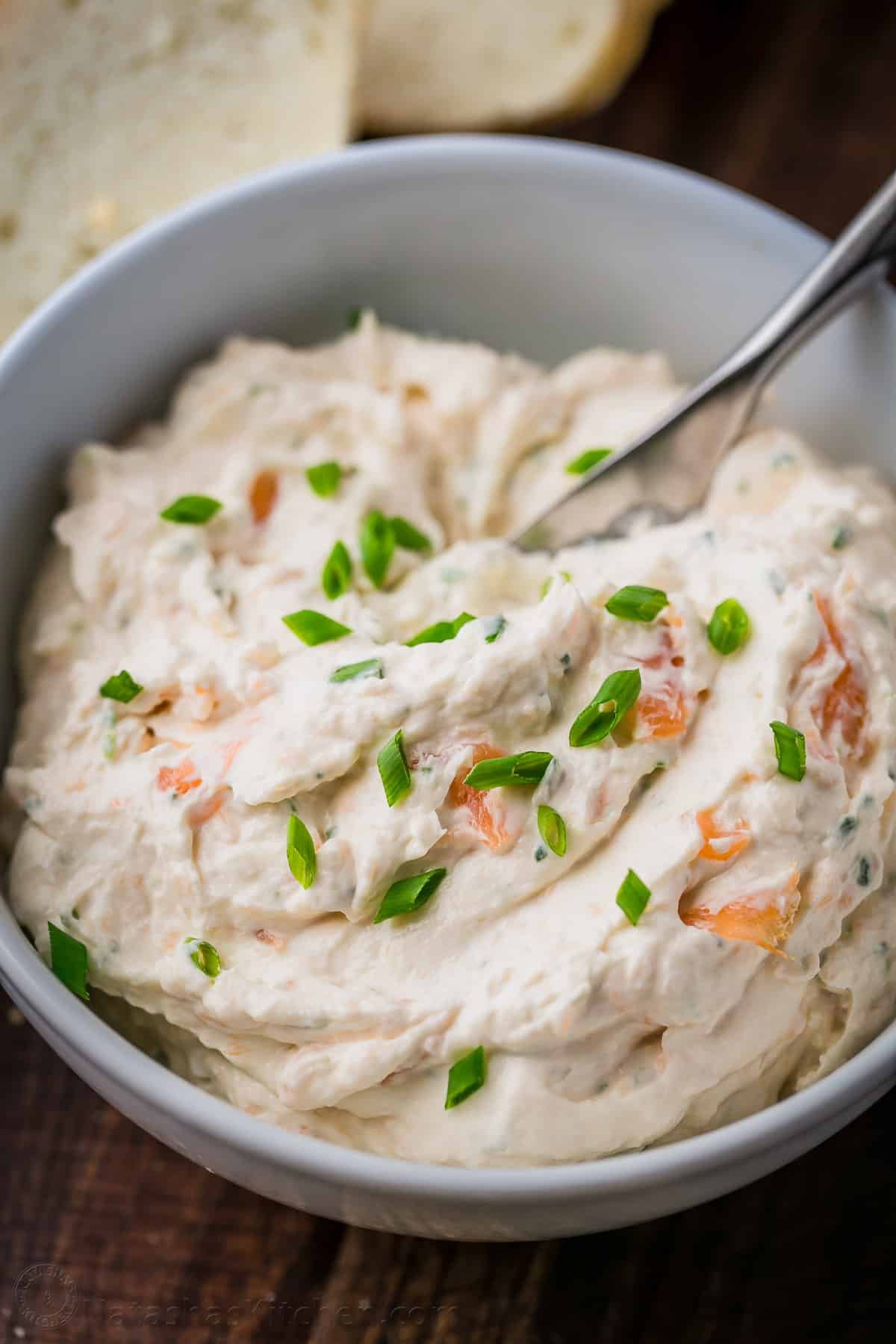 Appetizer fish dip with cream cheese served in a white bowl