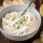Smoked Salmon Dip Recipe served in a white bowl with chives and salmon