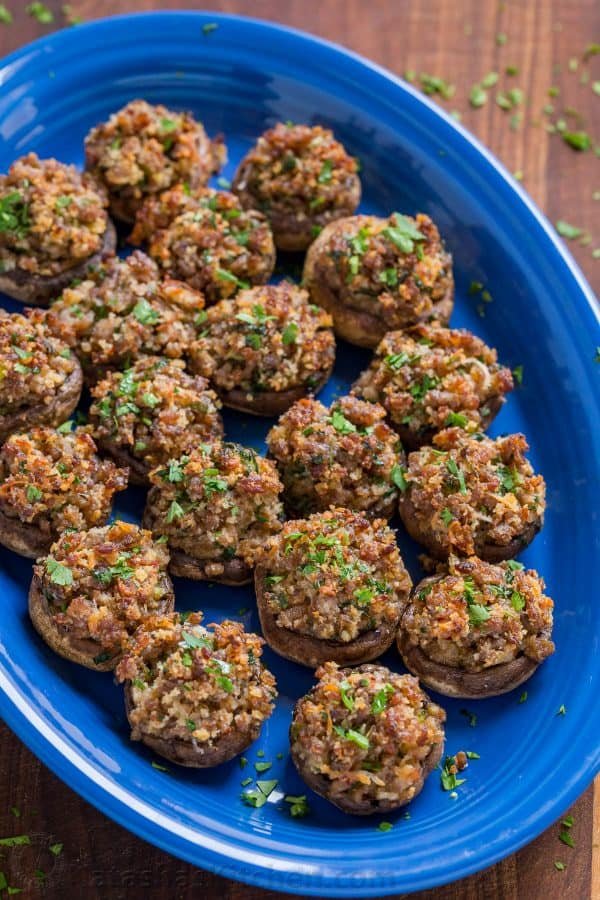 Sausage Stuffed Mushrooms are crunchy on top with a creamy and juicy center. They are loaded with flavor and really stand out as a holiday party appetizer. | natashaskitchen.com