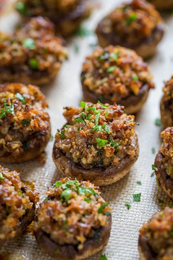 Sausage Stuffed Mushrooms are crunchy on top with a creamy and juicy center. They are loaded with flavor and really stand out as a holiday party appetizer. | natashaskitchen.com