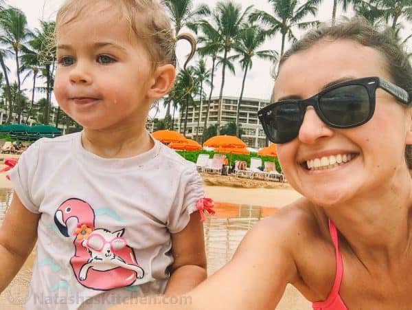 Natasha and her daughter smiling at the camera