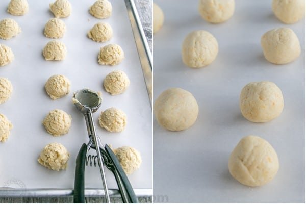 These almond snowball cookies just melt in your mouth. Perfect Christmas cookies since they look like darling little snowballs. How to form snowball cookies with mini cookie scoop