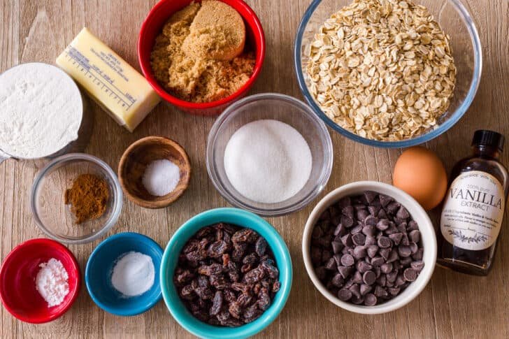 Ingredients for making oatmeal chocolate chip cookies with raisins