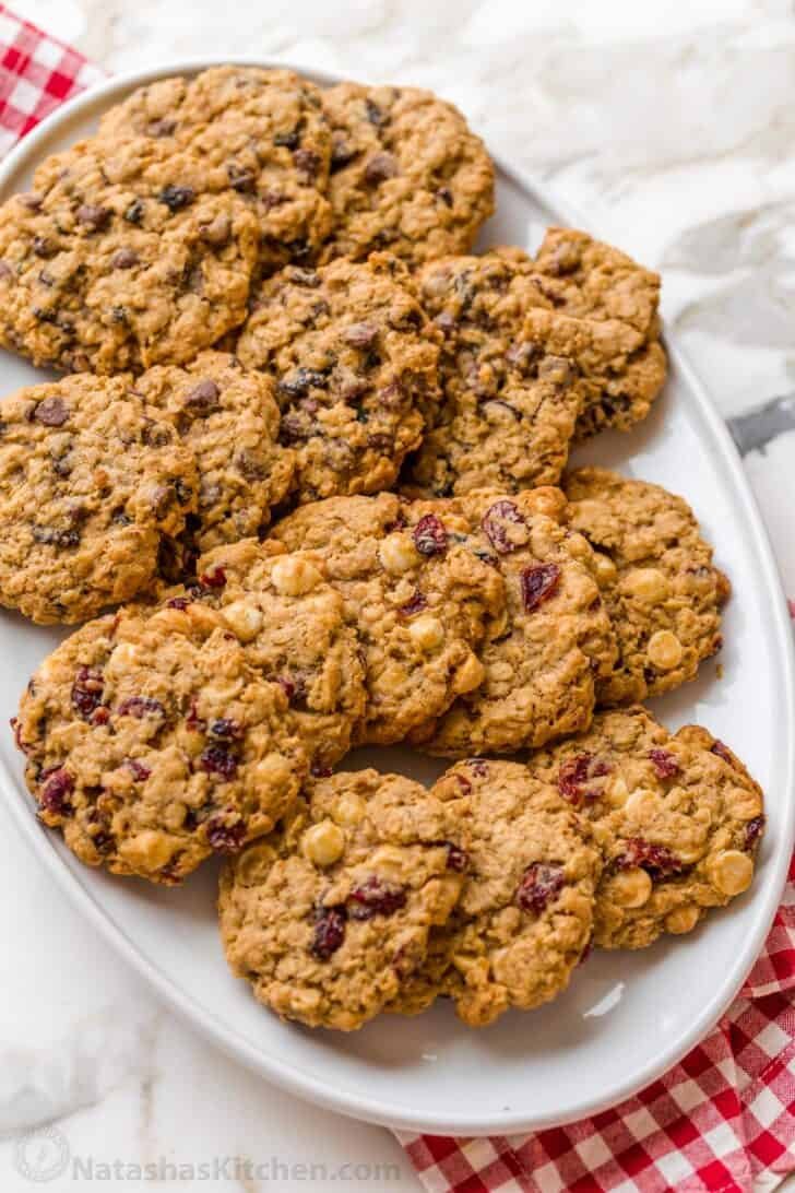 Oatmeal raisin and oatmeal cranberry cookies on a serving platter