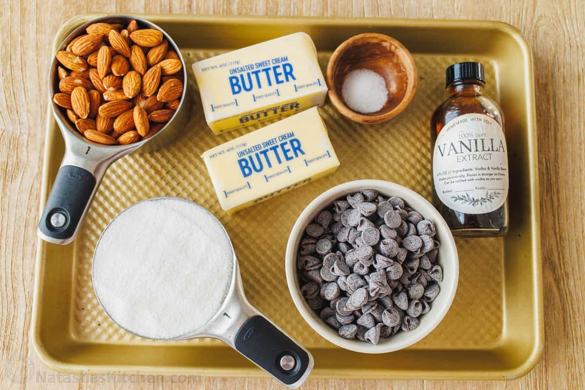 Our toffee recipe is buttery and crunchy with delicious layers of candy, chocolate and almonds. It's easy to make with only 5 ingredients. ingredients for homemade Health bars with almonds, butter, sugar, chocolate chips, salt and vanilla extract