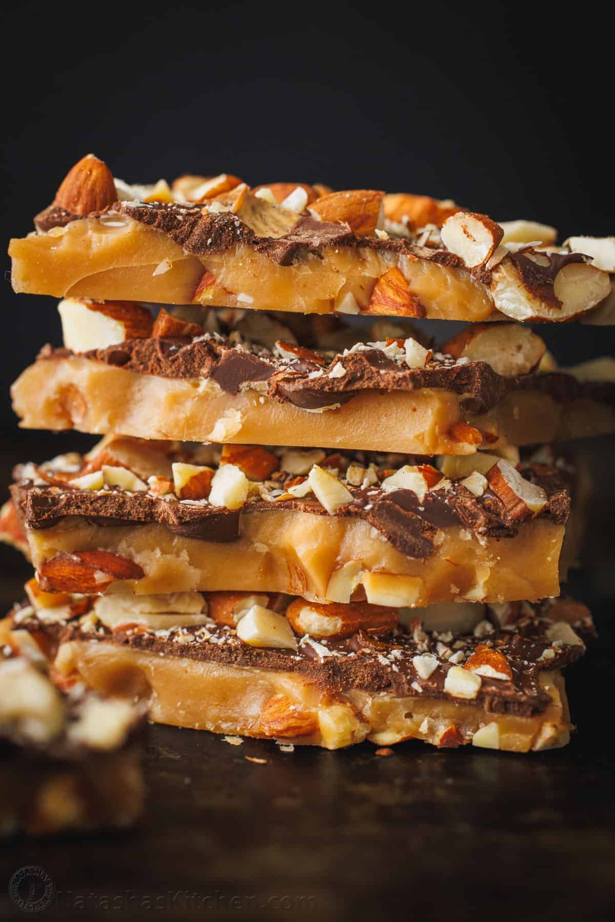 Our toffee recipe is buttery and crunchy with delicious layers of candy, chocolate and almonds. It's easy to make with only 5 ingredients. Delicious homemade toffee with almonds and chocolate layers