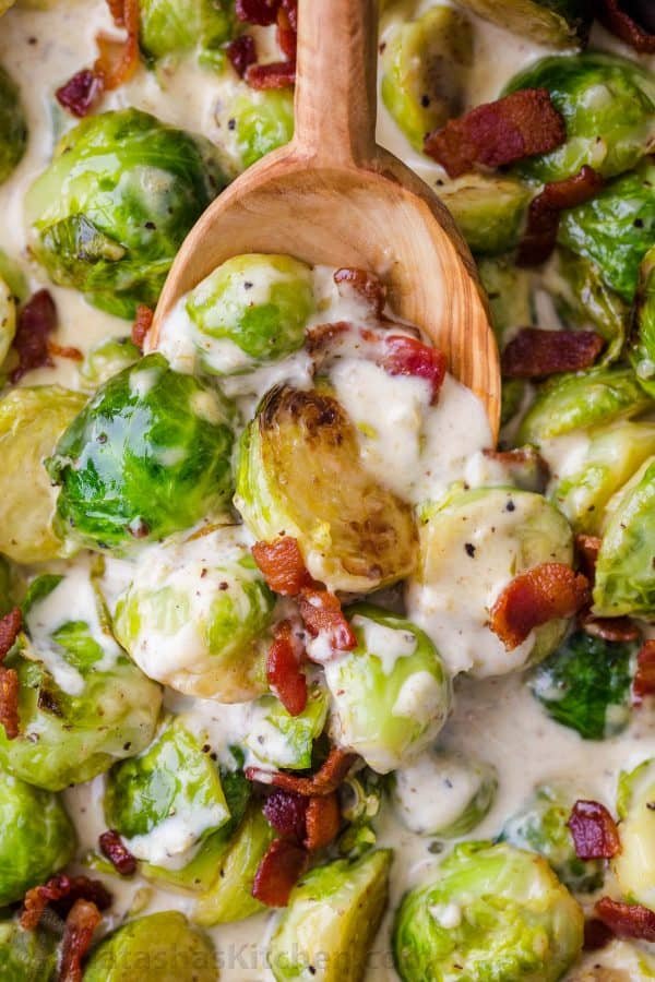 Brussels Sprouts in Aflredo Sauce topped with bacon 