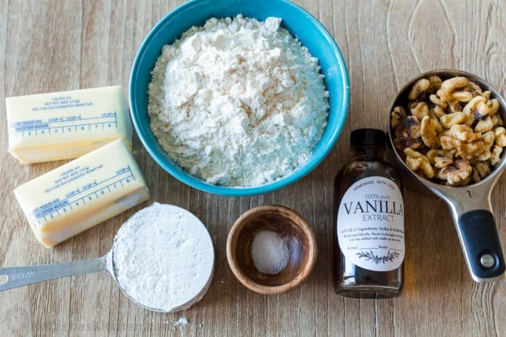 Russian Tea Cakes are easy to make and melt-in-your-mouth delicious. Add these little snowball cookies to your Christmas cookie platter. Ingredients for making snowball cookies
