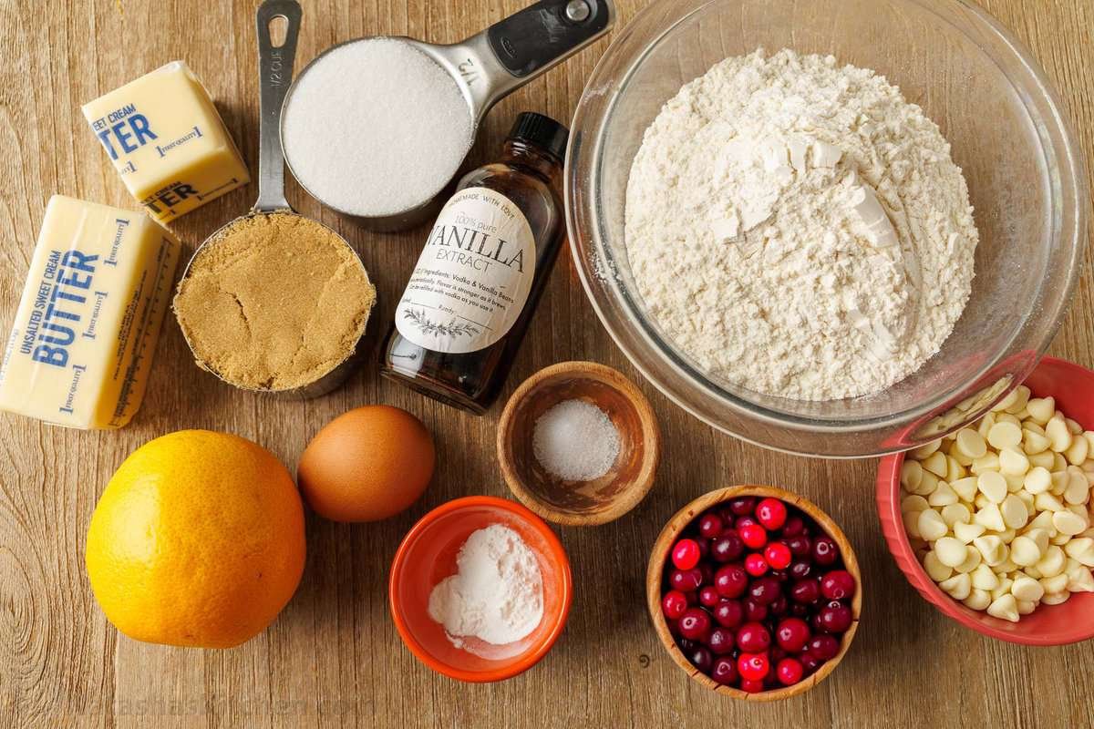 Ingredients for White Chocolate Cranberry Cookies Ingredients for white chocolate chip cranberry cookies: cranberries, orange zest, brown sugar, sugar, vanilla, egg, baking powder, flour, butter, salt