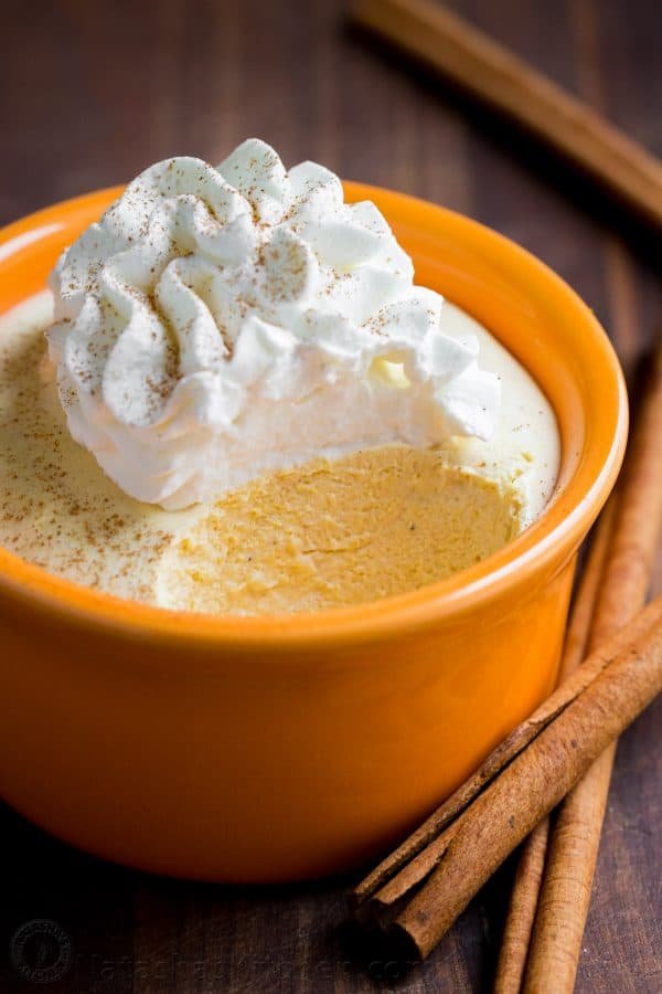 Pumpkin mousse cups have the taste and texture of whipped pumpkin pie. Smooth and airy pumpkin mousse recipe with the best rum-infused whipped cream! | natashaskitchen.com