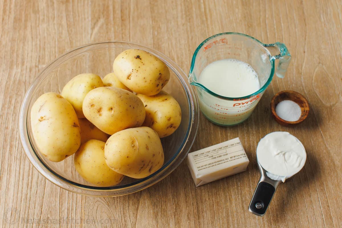 This is a simple sour cream mashed potatoes recipe with loads of buttery flavor. Enjoy homemade mashed potatoes as an easy, versatile side! The ingredients for homemade sour cream mashed potatoes.
