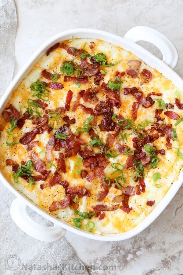 Loaded Baked Potatoes in a Casserole dish. 