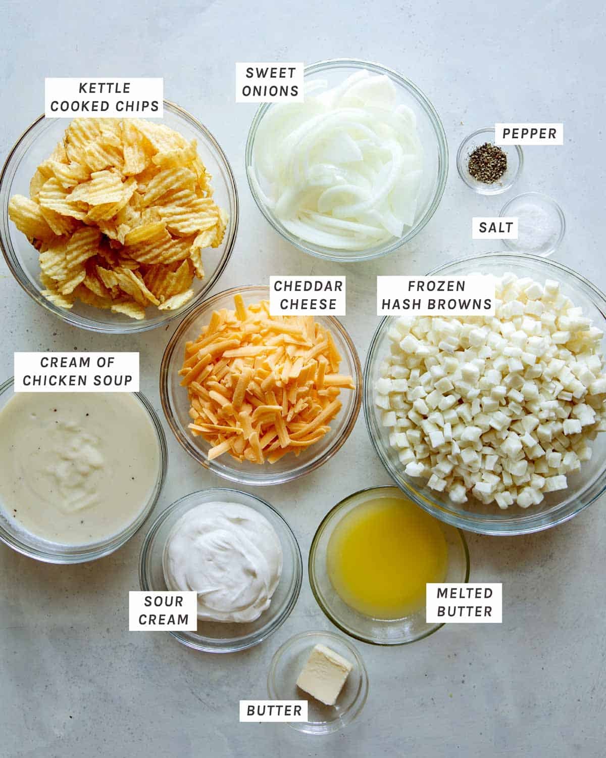 Ingredients for our Cheesy Potato Casserole all laid on a kitchen counter.