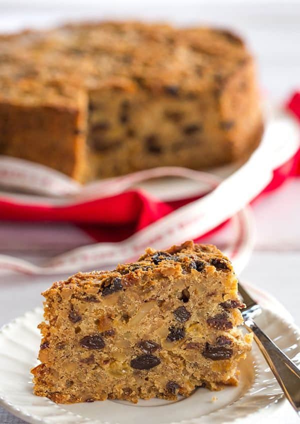 Christmas Cake - A wonderfully dense and moist fruit cake loaded with rum-soaked fruit! | https://www.browneyedbaker.com/christmas-cake/