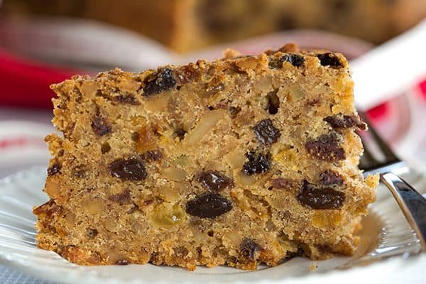Christmas Cake - A wonderfully dense and moist fruit cake loaded with rum-soaked fruit! | https://www.browneyedbaker.com/christmas-cake/