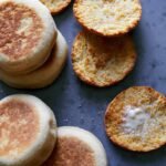 Homemade full and halved English muffins.