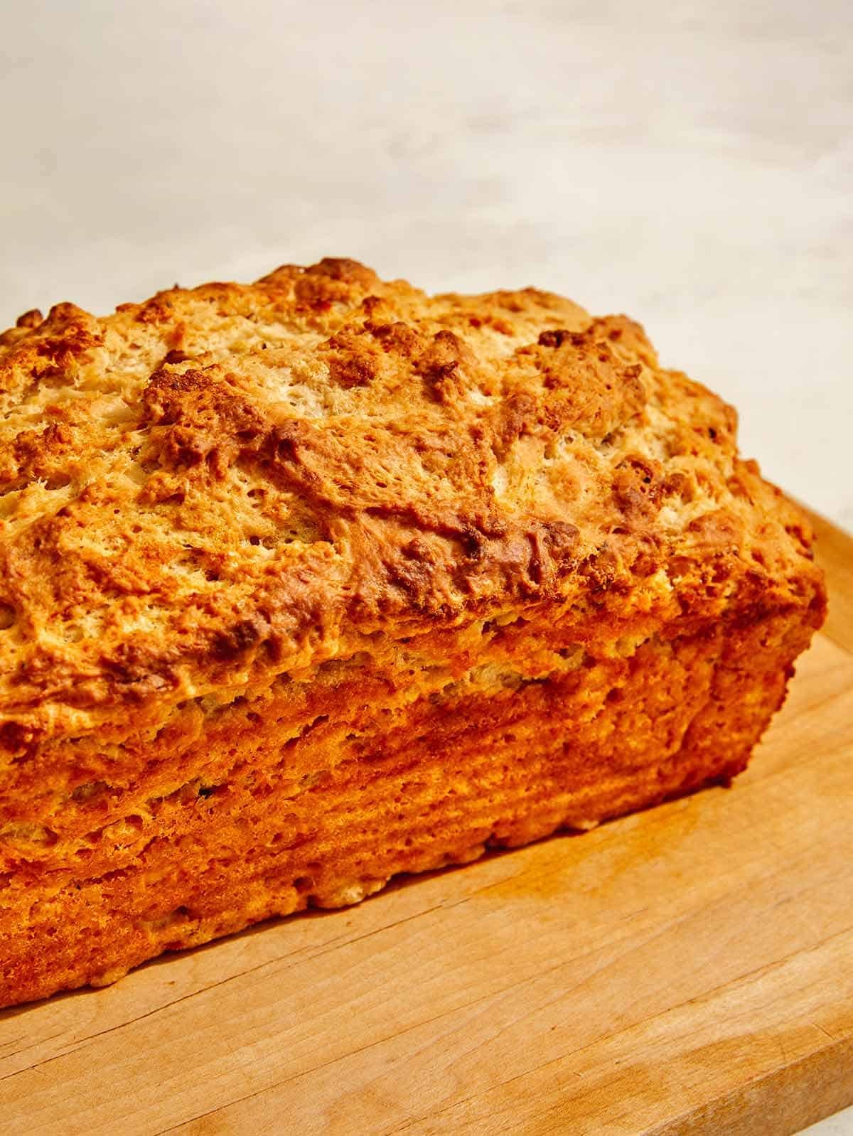 Beer bread on a cutting board.