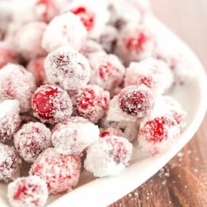 An easy recipe for sugared cranberries - a beautiful, sparkly garnish for your holiday desserts and cocktails! | browneyedbaker.com