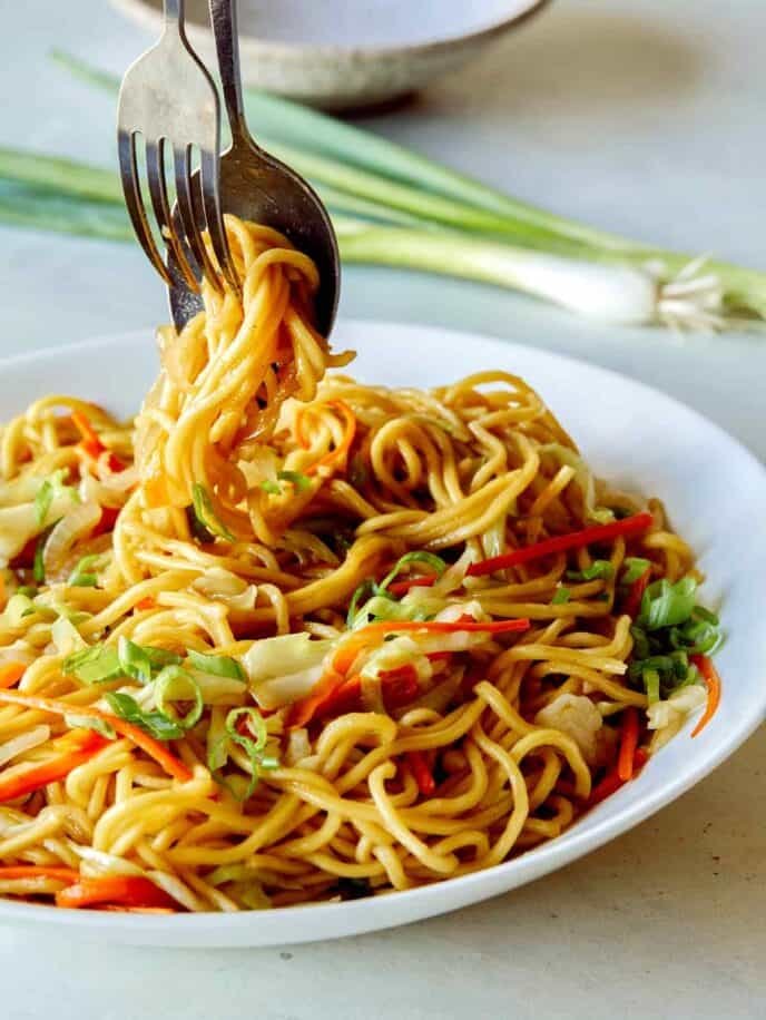Chow Mein Noodles in a platter being served. 