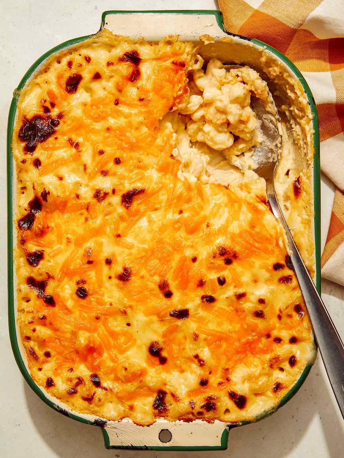 Baked mac and cheese close up in a casserole dish.