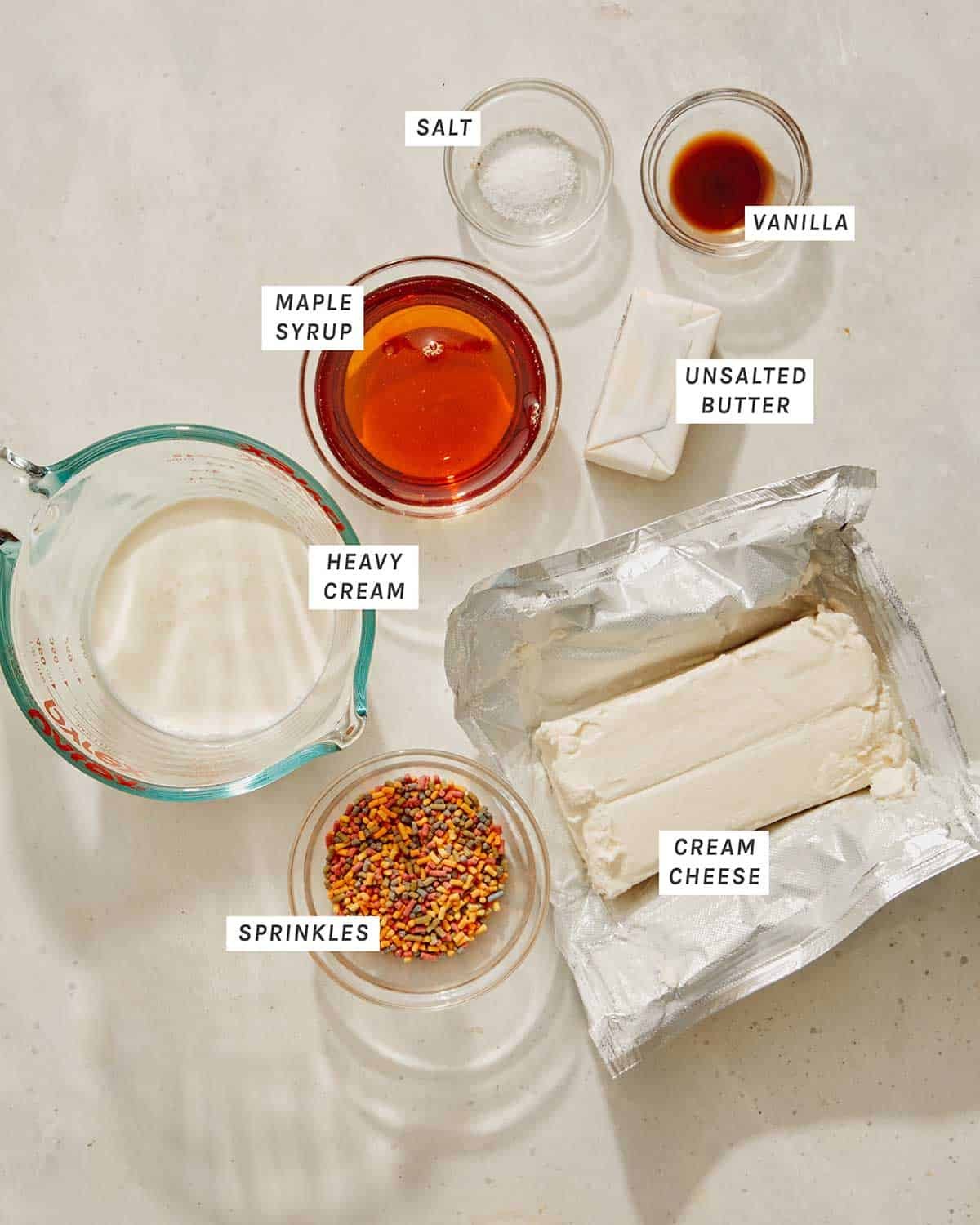 Smash cake frosting ingredients on a kitchen table.
